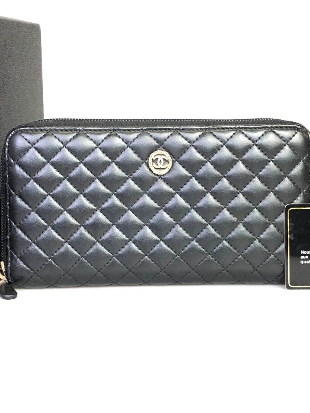 CHANEL Quilted Zip-Around Leather Wallet in Black with Silver CC